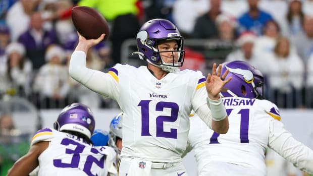Dec 24, 2023; Minneapolis, Minnesota, USA; Minnesota Vikings quarterback Nick Mullens (12) passes against the Detroit Lions during the first quarter at U.S. Bank Stadium.